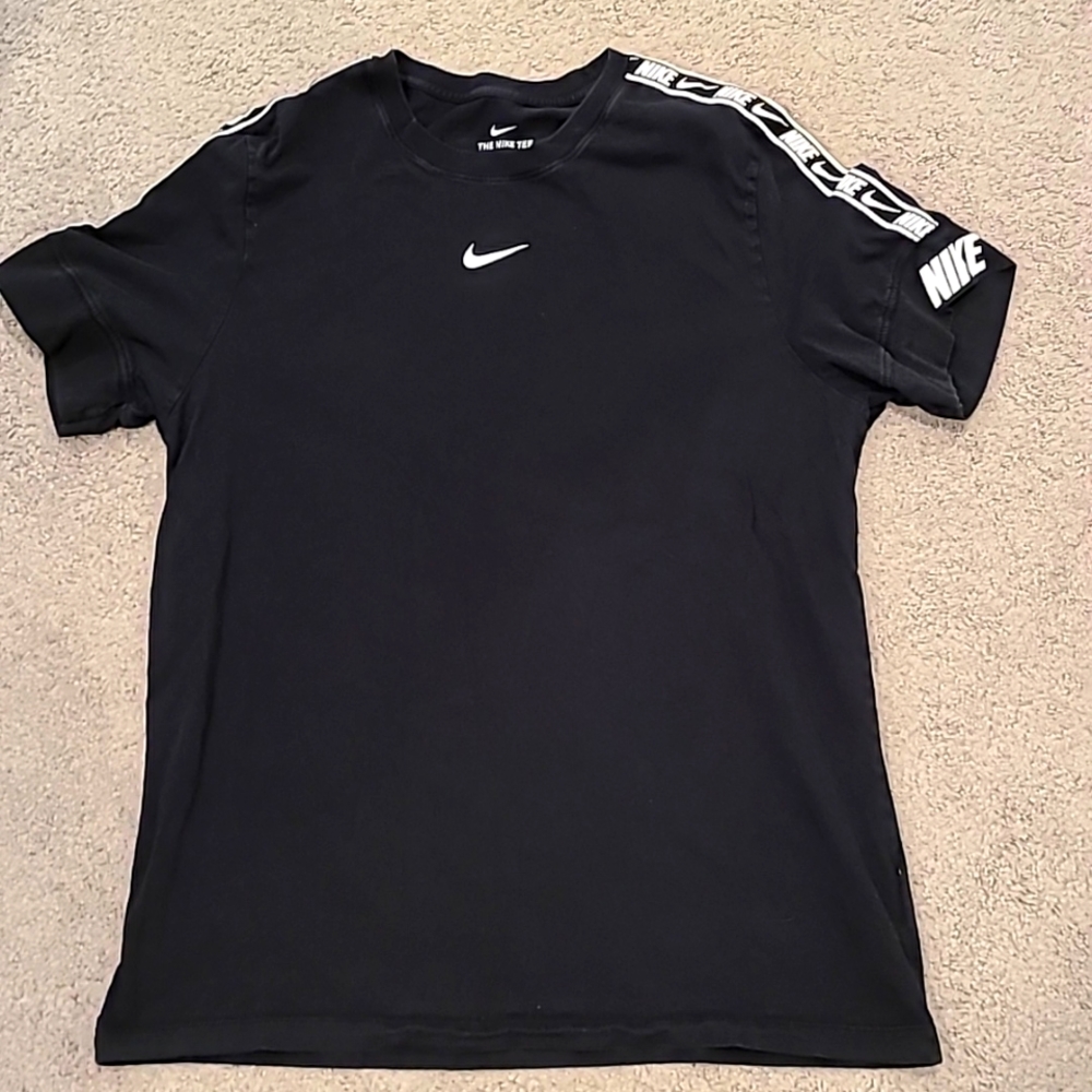 Nike shirt size xl black with white nike stripe down sleeves